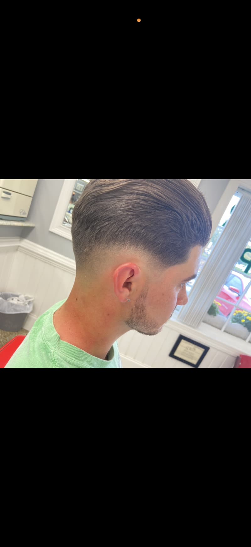 Clean side profile with fresh fade.